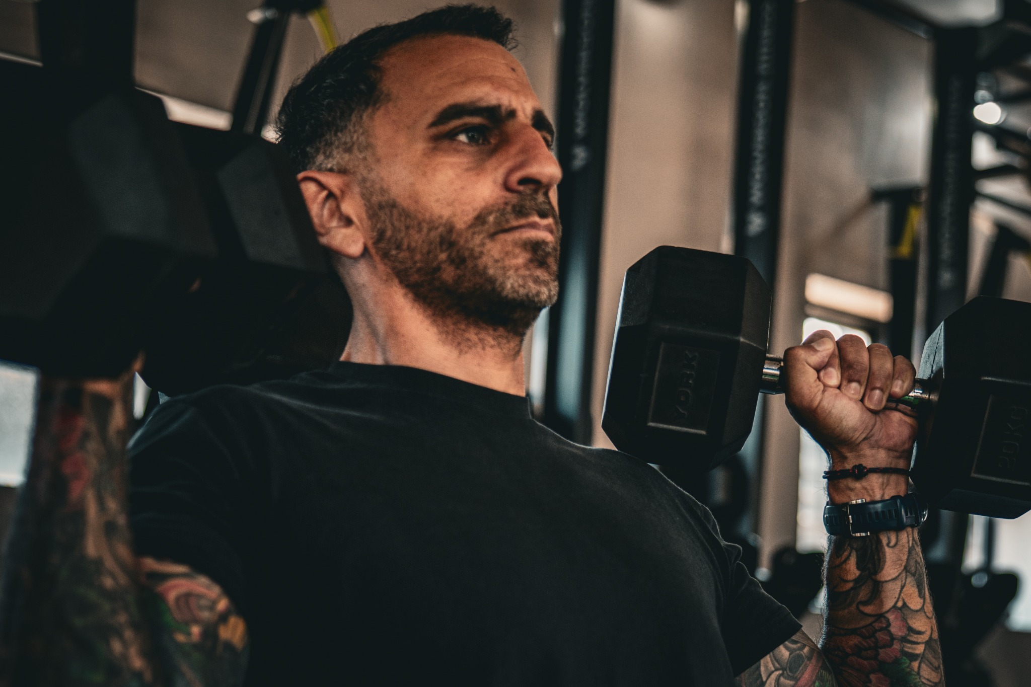 Gil Sassi training with dumbbells