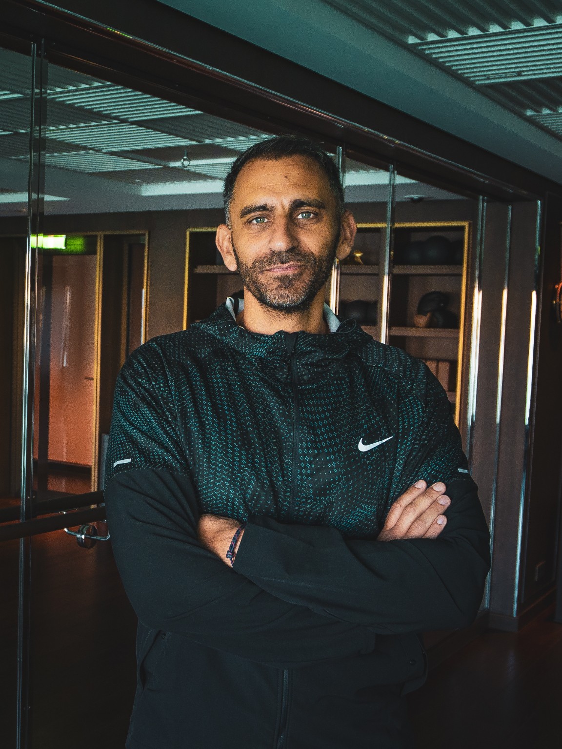 Portrait of Gil Sassi in a gym